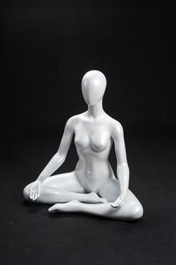 Abstract egghead Female Mannequins; Arms to sided and Right Leg Forward -  Chrome round Base; Semi-matte White Finish