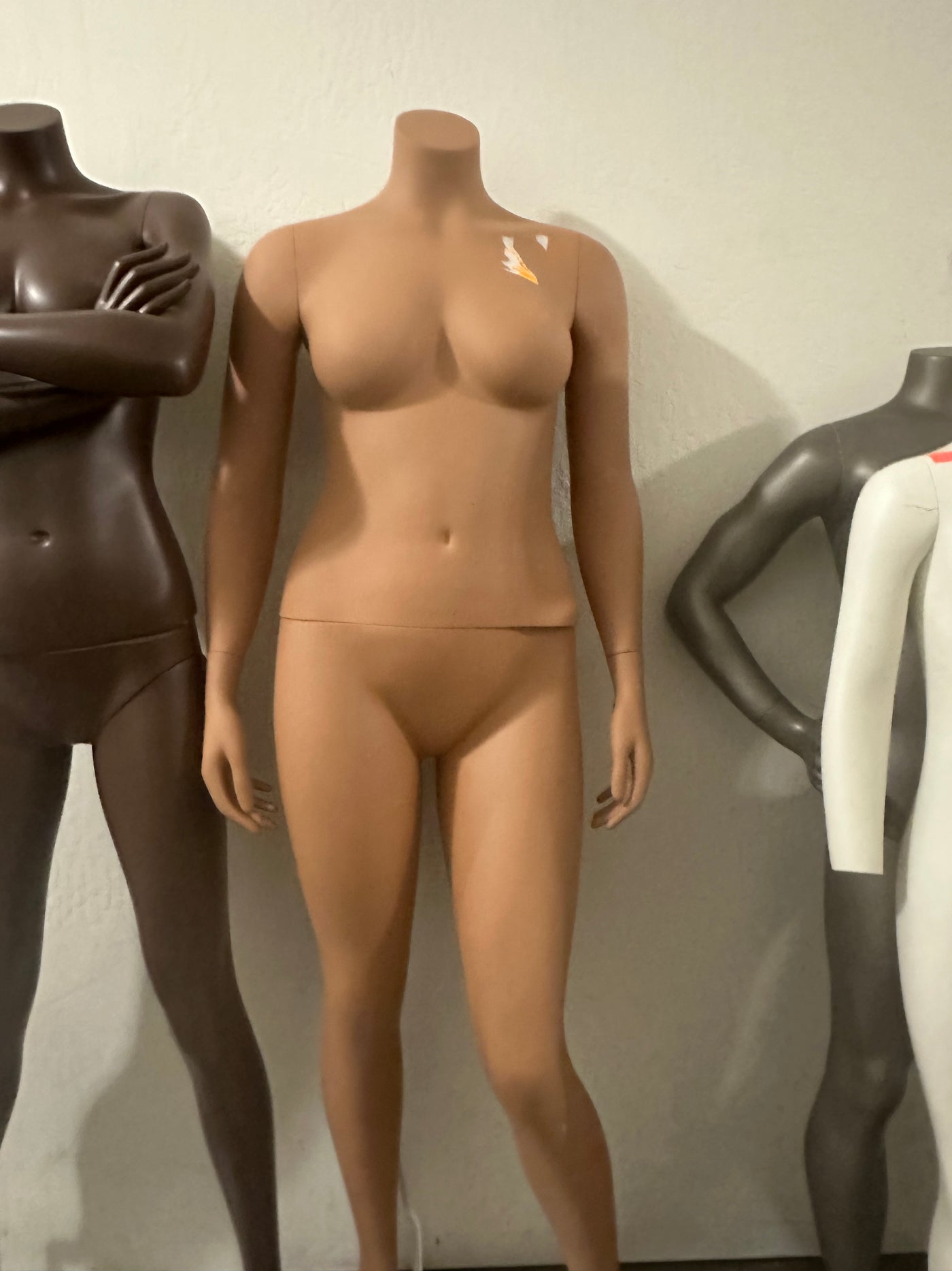 Used headless female mannequin - Tan