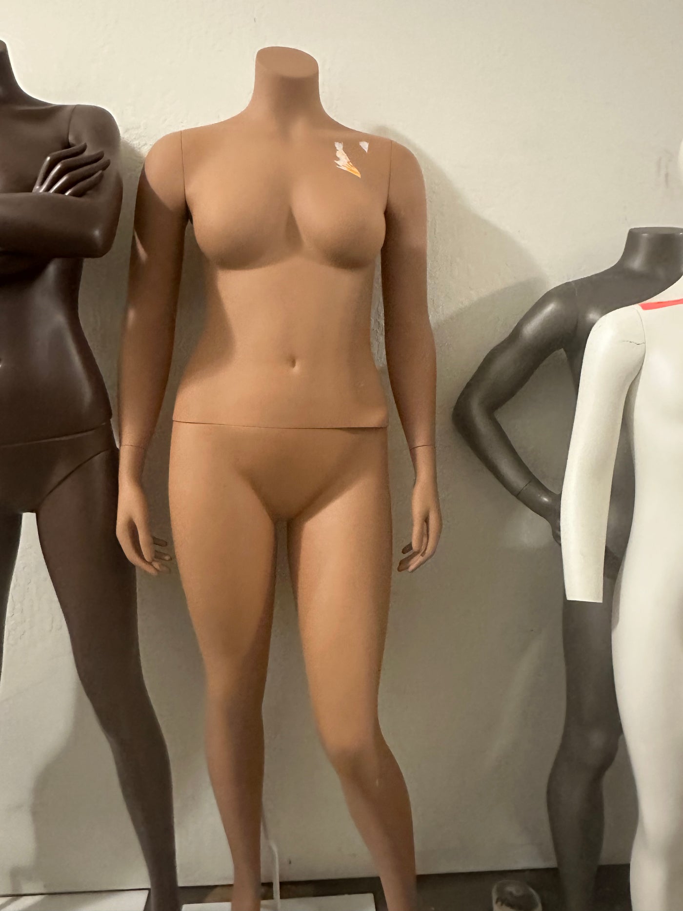 Used headless female mannequin - Tan