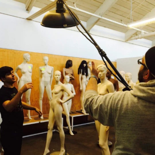 Photographers working in the Mannequin Madness warehouse