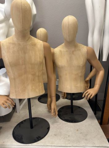 Used male mannequin torso with a head